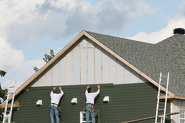 Professional Siding Contractor technician working in Greenville, NY
